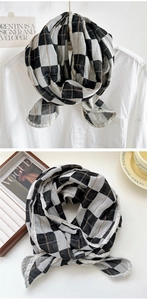 Makro-Detail des karierten Baumwoll-Leinen-Schals mit elegantem Vintage-Check-Muster
