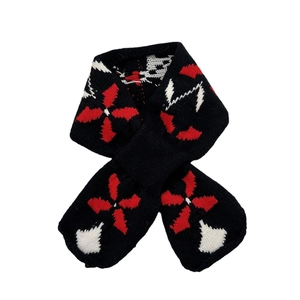 Winter knitted floral scarf with red and white jacquard pattern on a black base