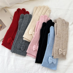Chic women's touchscreen knit gloves with bow detail in seven vibrant winter colors