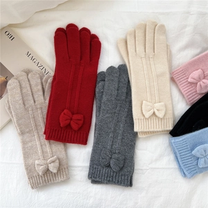 Cozy knitted bow gloves with touchscreen fingers for women in various pastel colors