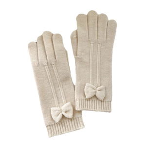 Cozy beige knitted gloves with ribbon bows and touchscreen fingers for winter warmth
