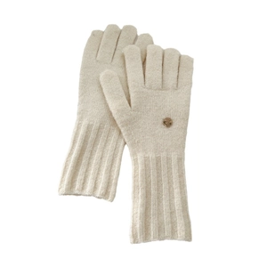 Creamy white knitted wool gloves with ribbed cuffs and gold metal badge detail