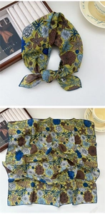 Detail of floral cotton linen square scarf showing knot style and full pattern display