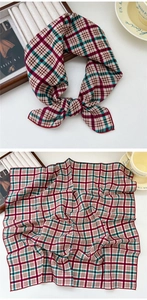 Detailed view of a vintage plaid cotton linen square scarf with red and green grid pattern