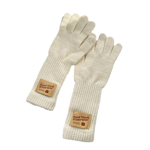 Cream knit winter gloves with thick thermal rib cuffs and leather bear patch decoration