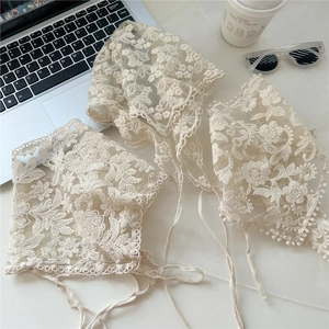 Three pieces of cream lace bandana with floral embroidery and delicate tassel trim