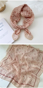Detailed view of pink floral cotton linen scarf with vintage rose and polka dot pattern