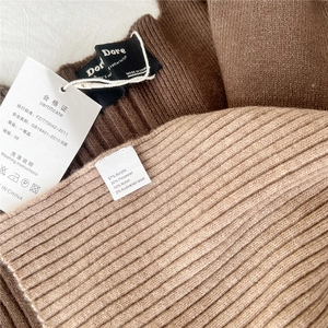 Chunky knit shawl wrap made of premium Australian wool blend in brown and beige tones