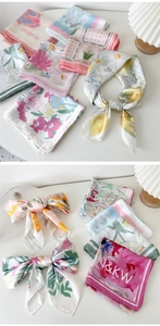 Détails de foulards en soie élégants aux motifs floraux et abstraits ton pastel