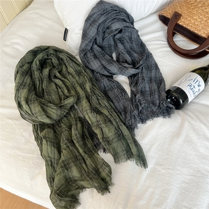 Long linen cotton plaid scarf with fringe edges in grey and green colors
