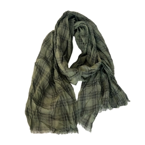 Long linen cotton scarf in green plaid check pattern with soft frayed fringe edges
