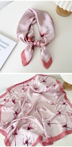Detailed view of a pink silk tulip flower square scarf with elegant glossy texture