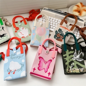 Schicke Strick-Handytaschen mit Cartoon-Mustern und langen Schulterriemen