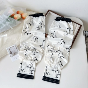 Detail of ice silk sun protection sleeves with traditional ink landscape print and cuffs