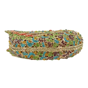 Retro bird clutch bag with colorful crystals and metallic frame for evening parties