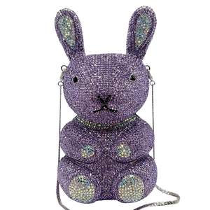 Macro detail of purple rabbit evening bag with intricate gradient crystal rhinestones
