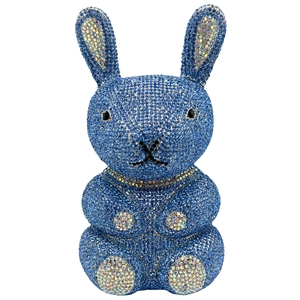 Close-up of vibrant blue rhinestone rabbit clutch bag showing detailed crystal craftsmanship