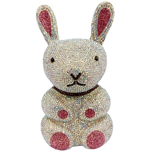 Macro detail of high-density AB rhinestones on the handmade rabbit-shaped evening clutch bag