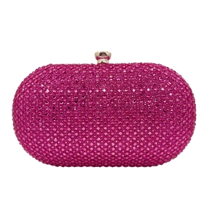 Detailed view of rose purple rhinestones on this oval evening clutch bag with metal clasp