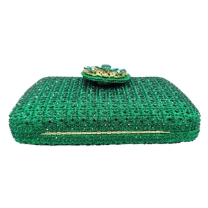 Luxury green crystal clutch bag with emerald flower clasp and gold metal frame