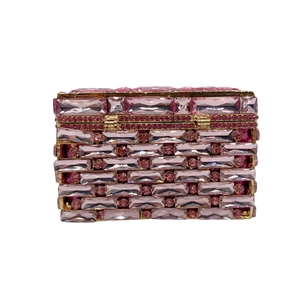 Pink rhinestone jewelry clutch bag with gold metal frame and sparkling crystal accents