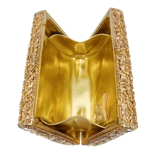 Golden rhinestone clutch bag with crystal hollow design and polished metallic interior