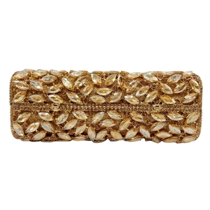 Close-up of rectangle champagne gold clutch bag with marquise and round rhinestones