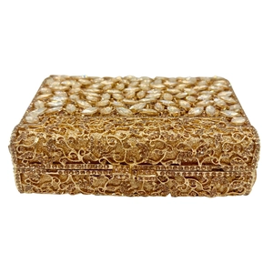 Elegant gold clutch bag with sparkling rhinestones and hollow-out floral metal design