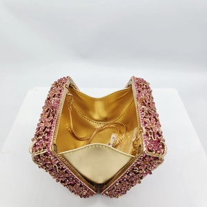 Exquisite hollow floral crystal clutch bag with pink rhinestones and gold chain strap