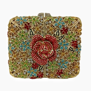 Close-up of sparkling colorful floral rhinestone patterns on a gold frame evening clutch