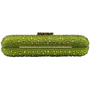 Close-up of lime green evening clutch featuring shimmering rhinestones and gold metal clasp