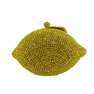 Luxury lemon-shaped evening clutch bag with sparkling yellow crystals and gold clasp