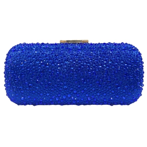 Royal blue evening clutch bag featuring a full rhinestone surface and gold clasp closure