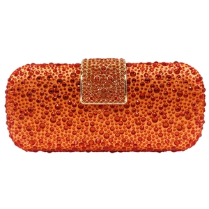 Detailed close-up of a sparkling orange gradient rhinestone clutch with gold crystal clasp