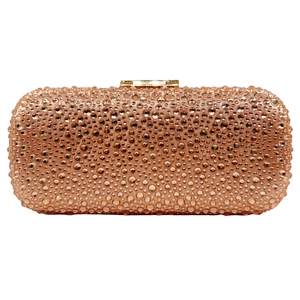 Close-up of sparkling full rhinestone surface on luxury evening clutch bag