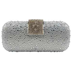 Detail of shimmering silver rhinestones and elegant metal clasp on luxury evening clutch