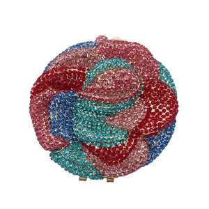 Luxurious rose blossom evening clutch bag with colorful rhinestones and gold clasp