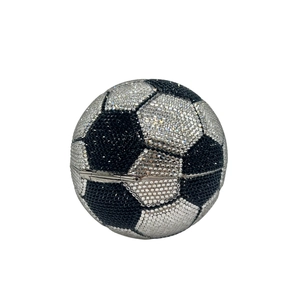 Detail of crystal-studded soccer ball clutch bag with sparkling black and white rhinestones