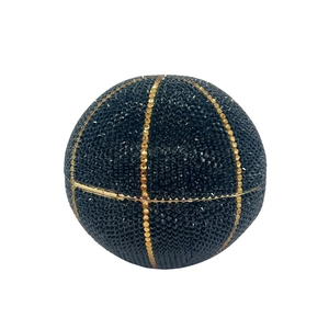 Detailed view of the sparkling crystal-encrusted basketball evening bag in black and gold