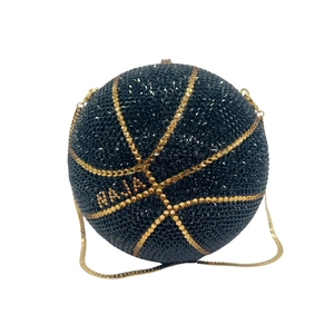 Spherical basketball evening clutch bag with black crystals and Houston gold lettering