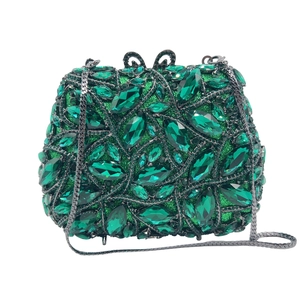 Luxe emerald green crystal clutch bag with marquee rhinestones and chain strap