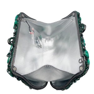 Deep green crystal studded hard shell clutch evening bag with silver metal interior