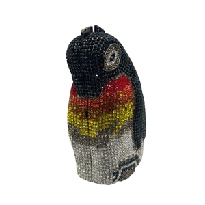 Detailed view of luxury penguin clutch bag with colorful rhinestones and metal clasp