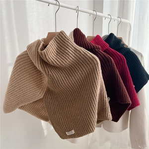 Two-tone knit turtleneck collar scarf in various colors with ribbed texture and split design
