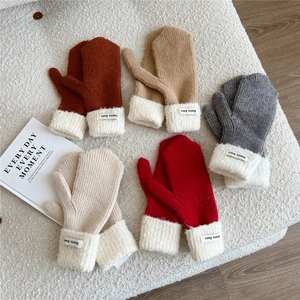 Winter knitted mittens in five colors with soft plush cuffs and minimalist branding labels