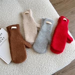 Cozy thick knitted mittens in various colors for women with warm ribbed cuffs