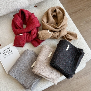 Thick knitted winter scarves for men and women in various colors with a tweed pattern