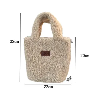 Detail of beige plush handbag with dimensions: 32cm height and 10cm bottom width