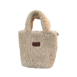 Chic off-white faux fur plush handbag with leather HSNM logo and metal rings