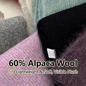 Knitted alpaca wool scarf with 60% alpaca fiber showing soft texture and premium quality
